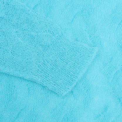 LOOSE KNIT CROSS CABLE